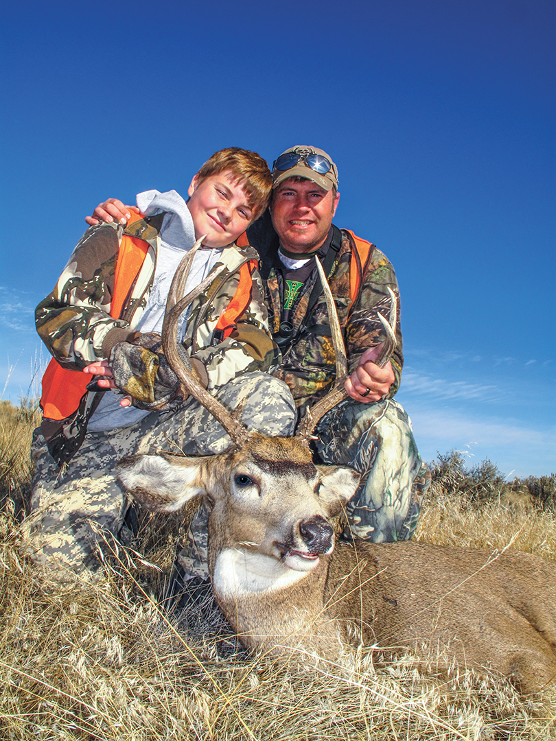 Jason’s nephew poses with a buck found on the edge of a wheat field.